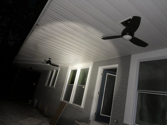 Plugged Electricians ATL — finished porch ceiling fan with wood blades and pendant-style light kit